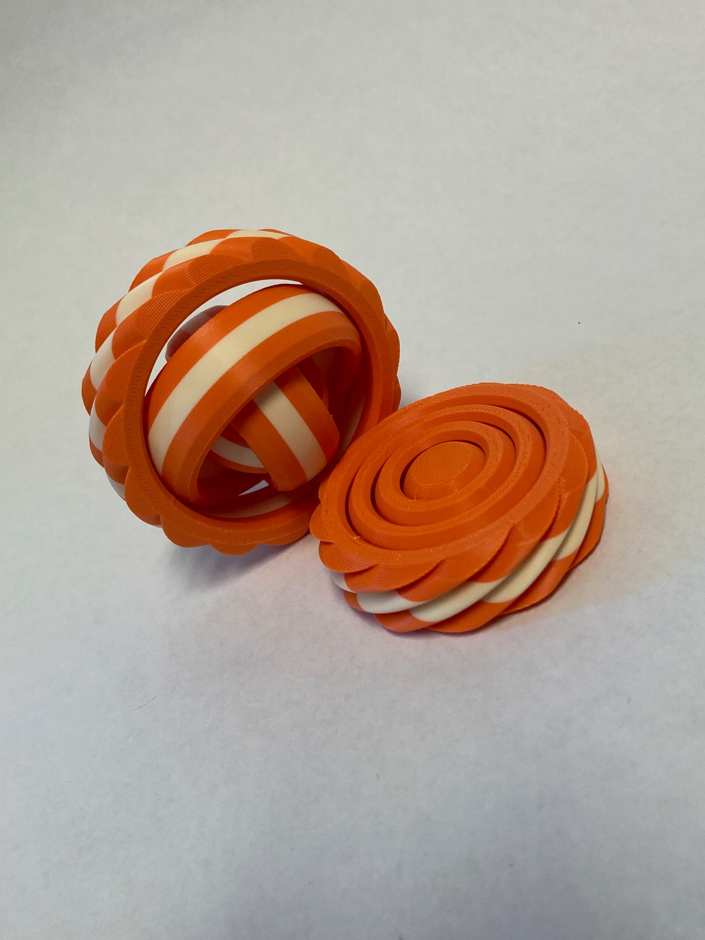 4-Ring Twisty Gyro Spinner (Three Color)